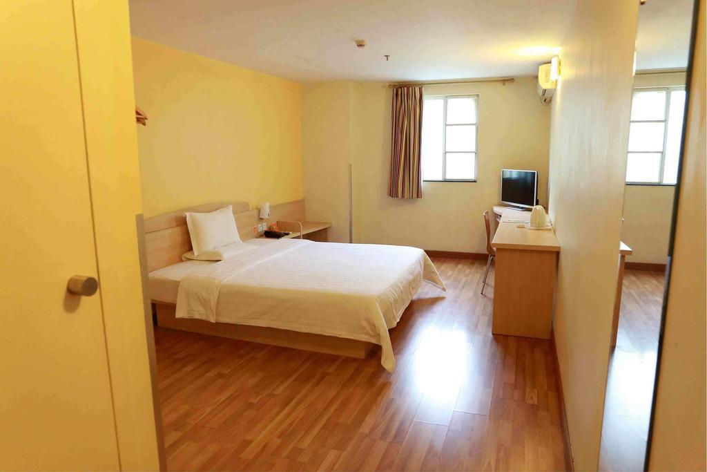 7Days Inn Guangzhou Wuyang New Town Номер фото